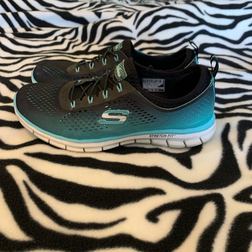 Blue and black Sketchers.